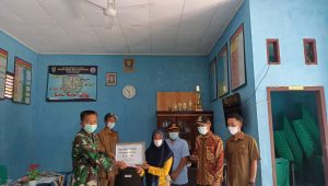 IMG-20210727-WA0010 Babinsa Koramil Tanah Tumbuh Dampingi Pembagian BLT DD