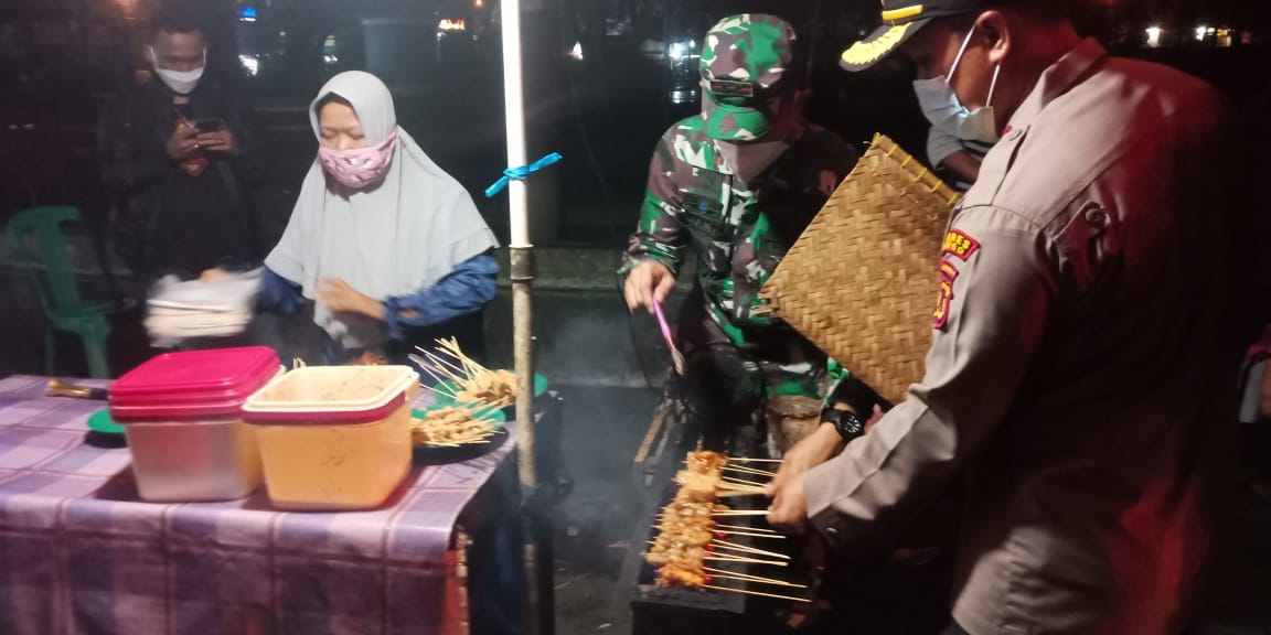 Kapolres Bungo Didampingi Dandim 0416/Bute Pimpin Operasi Yustisi, Ajak PKL Ikut Vaksinasi
