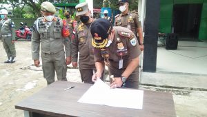 foto-penandatanganan-satpol-pp Dua Oknum Anggota Satpol-PP di Pecat Akibat Pungli Dimasa PPKM.