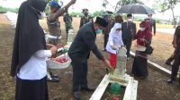 foto bupati bungo tabur bunga di tmp