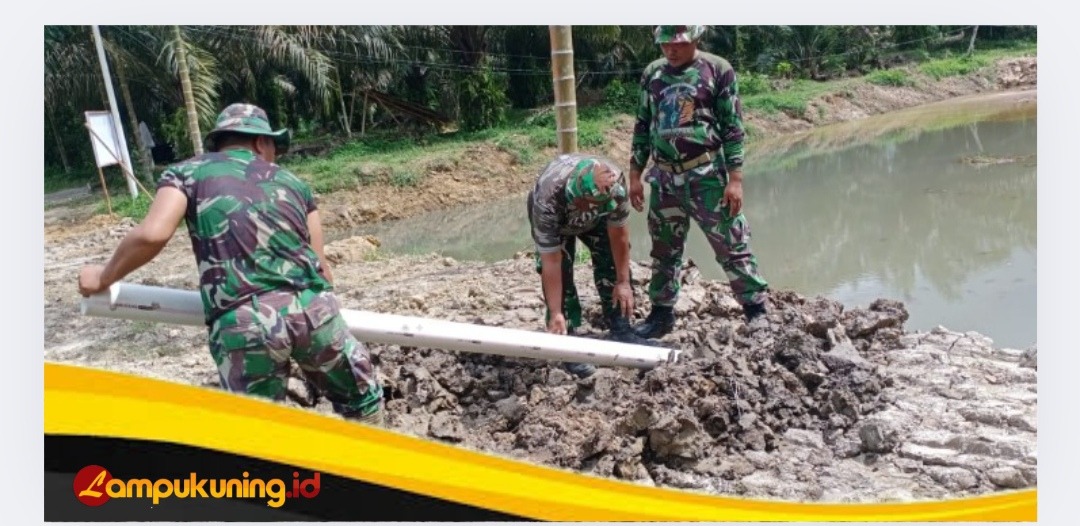 Satgas TMMD 123 Kodim 0416/Bute  Mulai Melakukan Pemasangan Pipa Air Kolam Ikan