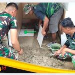 Personel Satgas TMMD Ke-129 Kodim 0416/Bute Mulai Pasang Keramik Tempat Wudlu Langgar Nurul Fajri