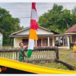 IMG_20260731_093042 Pemasasangan Bendera Merah Putih, Sertu Hanri Nopaldi Anggota Satgas TMMD Ke-129: Semangat Kemerdekaan Terus Ditanamkan Ke Masyarakat